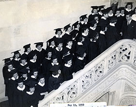 Graduating students on stairs