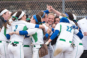 Women's softball team celebrating. Link to Gifts of Cash, Checks, and Credit Cards